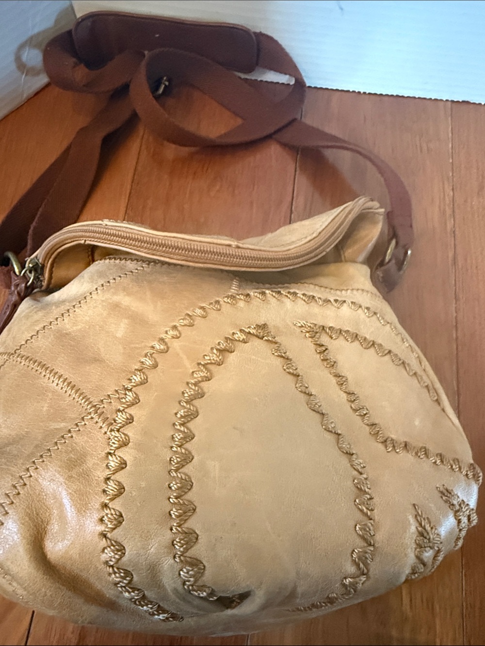 The Sak Deena fold-over crescent crossbody bag. tan leather peace sign stitch - Picture 2 of 11